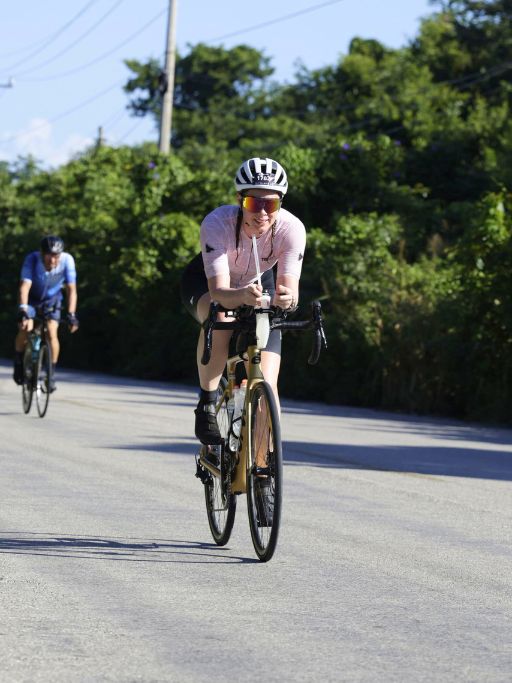 Athletes riding the bike course during Ironman Cozumel 2025.
